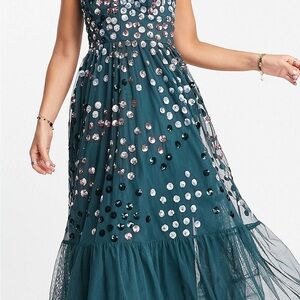 NWT Jade green long dress. Prefect for a wedding or special occasion. Size 4